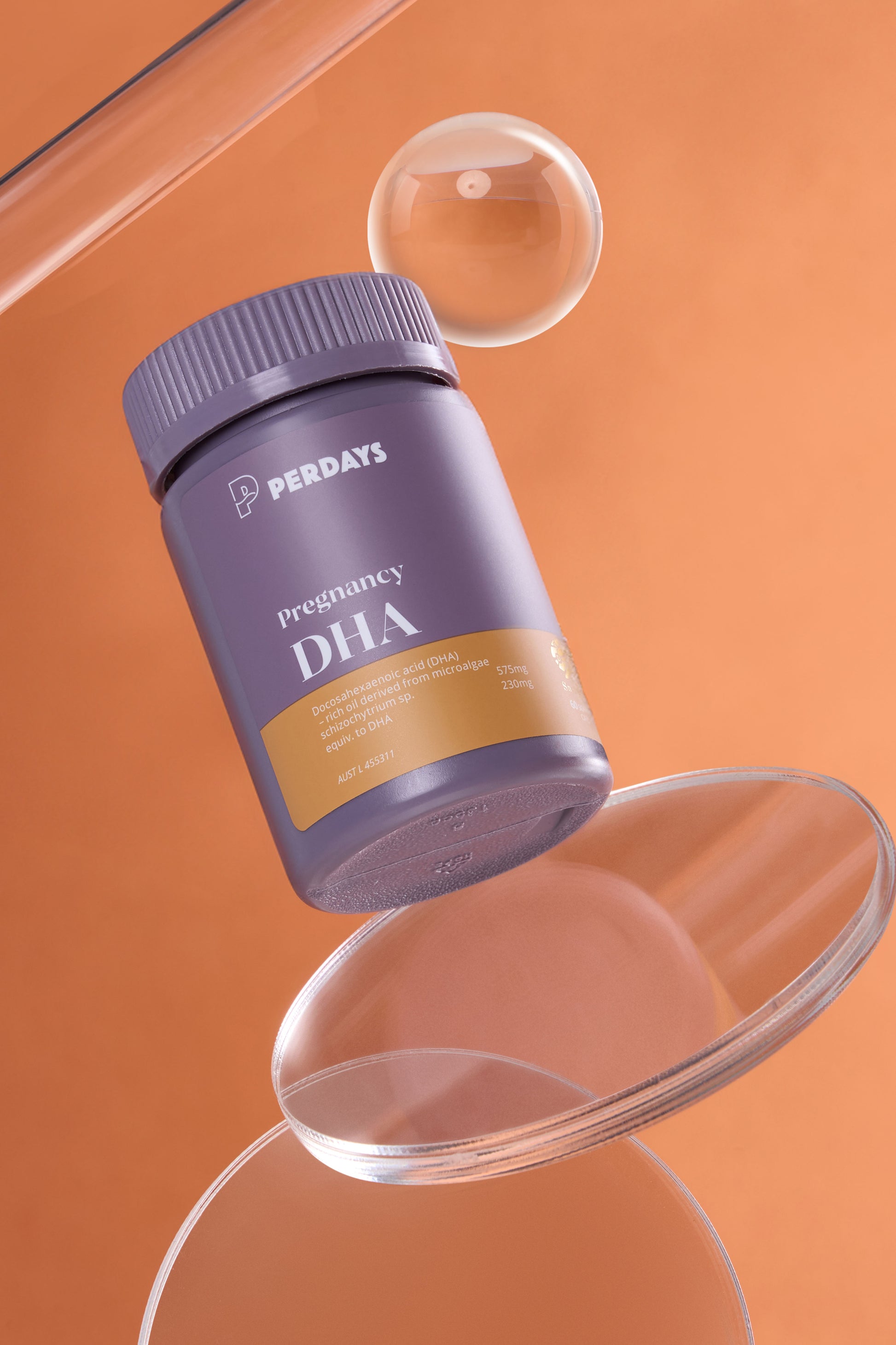 Perdays Pregnancy DHA supplement bottle on an orange background